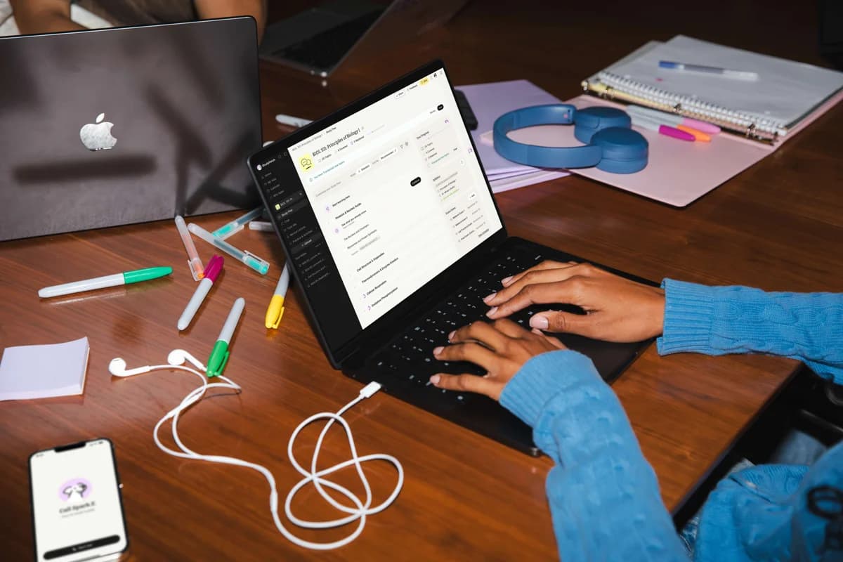 Student working on a laptop at a study desk